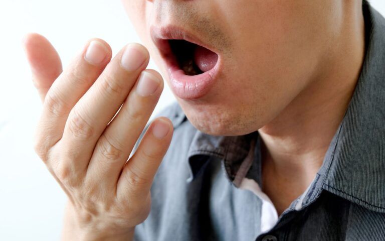 Person Experiencing Bad Breath