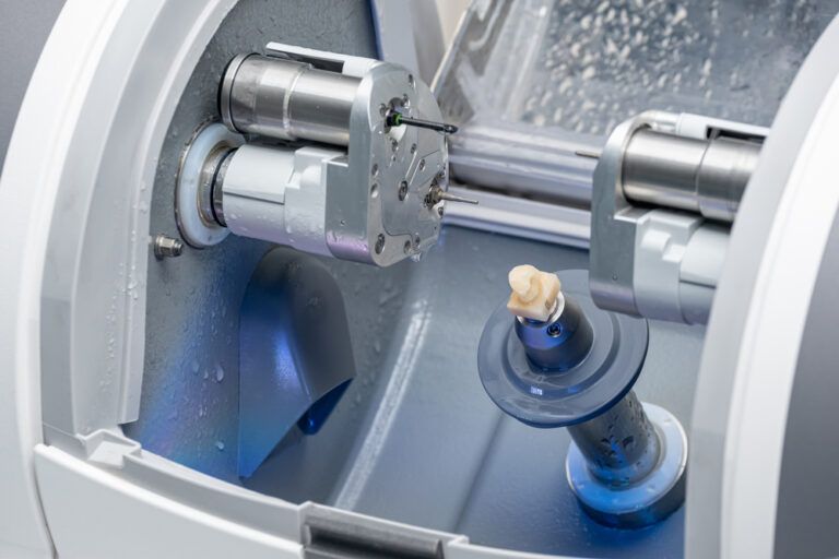 CAD CAM dental computer-aided machine. Digital modern dental laboratory for prosthesis and crowns milling