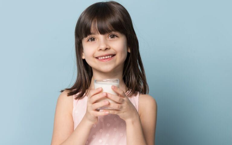 A Child Drinking Milk