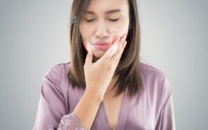 Woman with Jaw Pain