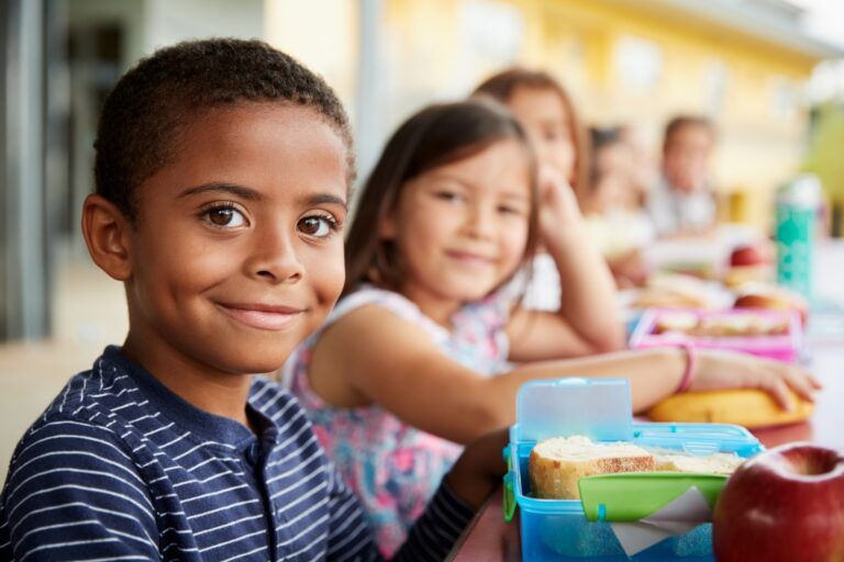 Group of Children Smiling at School