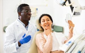 Woman With Happy Smile at Dentist Office