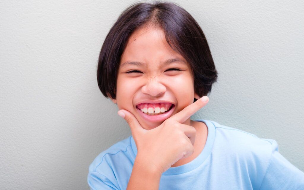 What Causes a Gummy Smile and Can it Be Fixed? Massih Orthodontics