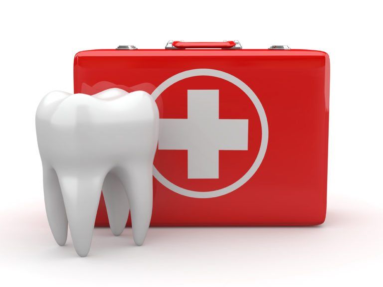 Tooth standing in front of red emergency kit