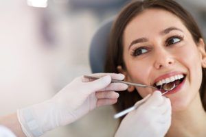 woman sitting in dental chair