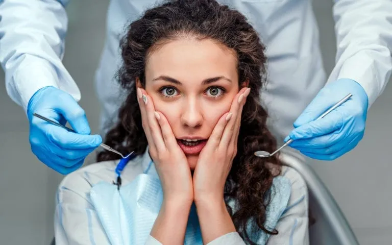 Scared Woman At Dentist