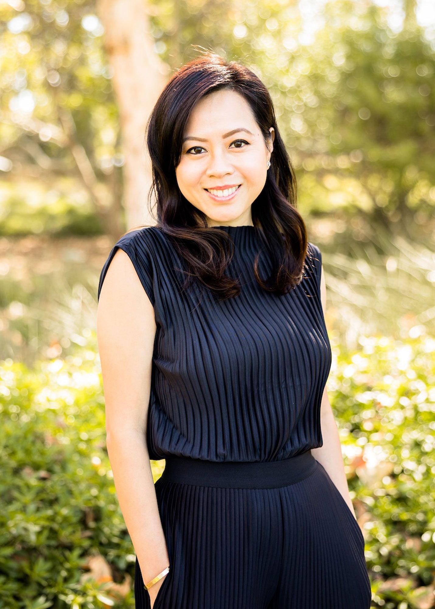 Asian Female Dentist Smiling 