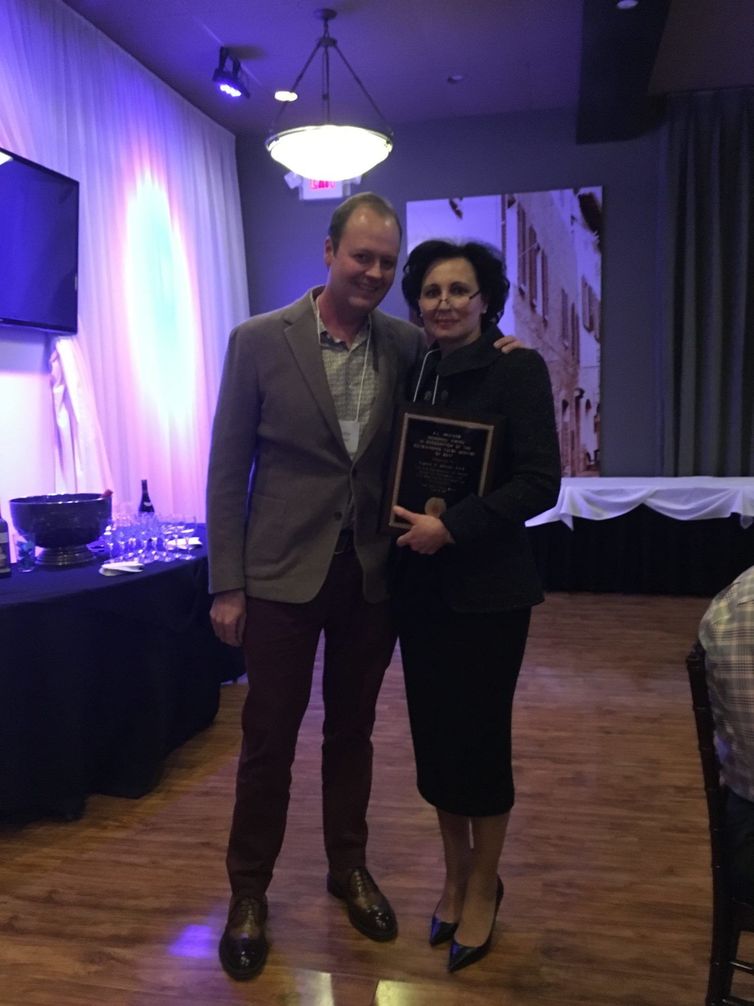 Dr. Robert Herman Presenting the Dentist of the Year Award Superior