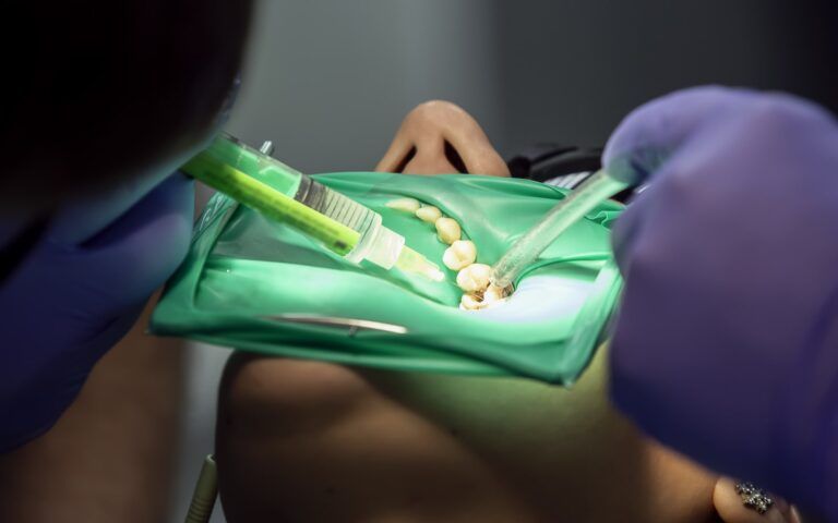 Man undergoing oral surgery