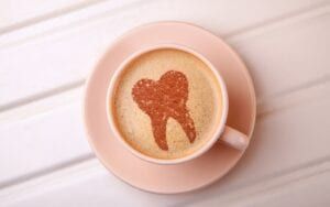 Cup with tooth dental art